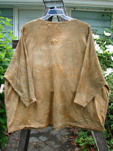 Barclay Cotton Lycra Writer's Pocket Pullover Sweatshirt in mottled mustard, featuring a seamless front and back, dual drop flop pockets, and floral theme paint, embodies vintage style from Bluefishfinder.com.