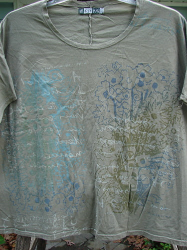 Barclay Cricket Cap Sleeve Tee Script Garden Bottlecap OSFA, featuring cap sleeves, a rounded hemline, and seamless shoulder design. Made from lightweight organic cotton, reflecting Bluefishfinder.com's vintage clothing ethos.