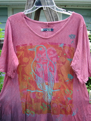Barclay Slub Curve Bottom Tee Bird Perched Mottled Magenta Size 0 features a rounded neckline, short sleeves, and a varying hemline, embodying Bluefishfinder.com's vintage-inspired, creative fashion ethos.