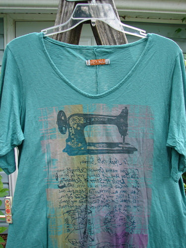 Barclay Slub Curve Bottom Tee Singer Seamstress Spearmint Size 1 features a unique rounded neckline, short sleeves, A-line shape, and varying hemline, embodying BlueFish vintage style creativity.