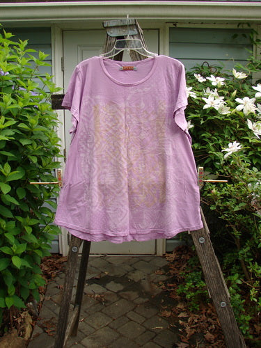 Barclay Short Sleeved Travel Tee Continuous Turn Pink Peony Size 1 features a rounded neckline, slightly longer cap sleeves, and A-line shape. Made from medium-weight organic cotton, perfect for expressing individuality.