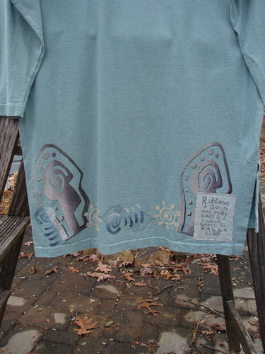 1996 Trifocal Top Celestial Trinket Size 1 featuring a painted abstract forest theme, sectional collar, rear shirttail hemline, and Blue Fish patch on lower hem, showcasing unique vintage Blue Fish style.