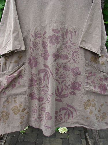 Barclay Percal Urchin Dress Climbing Garden Stripe Rock Size 0: A loose-fitting knee-length smock adorned with stylized vegetables and botanical motifs, featuring large patch pockets at hip height, reflecting BlueFishFinder's vintage creative style.