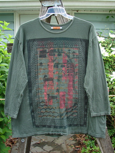 Barclay Long Sleeved Studio Tee in Army Green features a Primitive Times theme, straight shape, rounded neckline, and long cozy sleeves, representing BlueFishFinder's vintage and expressive style.