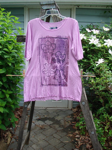 Barclay Slub Modal Three Quarter Sleeved Cafe Tee Lotus Pink Peony Size 0 features a rounded neckline, three-quarter sleeves, A-line flare, curly edges, and lotus flower theme, ideal for vintage style enthusiasts.