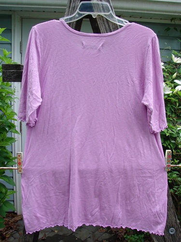 Barclay Slub Modal Three Quarter Sleeved Cafe Tee Lotus Pink Peony Size 0 features a rounded neckline, three-quarter sleeves, curly edges, slight A-line flare, and lotus flower theme.