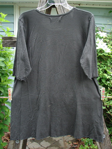 Barclay Slub Three Quarter Sleeved Cafe Tee Night Fern Raven Size 1 features a rounded neckline, slight A-line flare, three-quarter sleeves, curly edges, and a varying hemline, embodying creative vintage style.