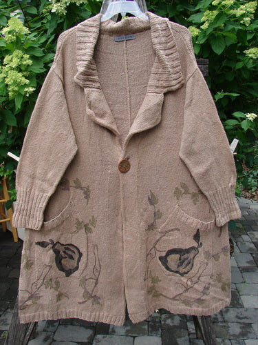 1998 Cotton Knit Canyon Cardigan Sweater Coat Pear Harvest Aspen OSFA displayed outdoors on a hanger, featuring a shawl collar, oversized clay button, ribbed cuffs, embroidered patch pockets, and an A-line shape.