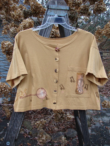 1994 Song Top Make Music Dijon Size 2, featuring handwritten musical notes, wide crop box shape, oversized front painted breast pocket, and matching oversized buttons.