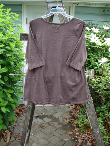 Barclay Three Quarter Sleeved Studio Tee Ex Libris Mocha Size 1 features a straight shape with slight A-line flare, three-quarter sleeves, and a rounded neckline, showcasing the Ex Libris theme design.