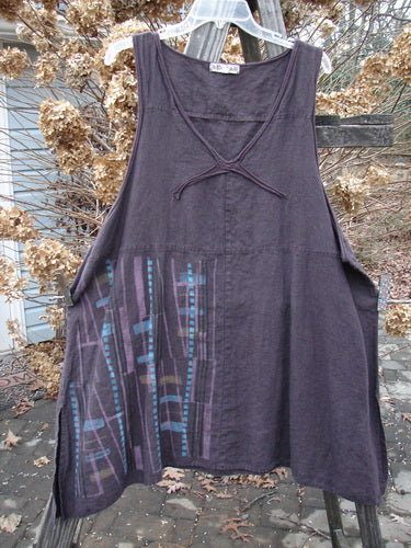 Barclay Linen Cross Over Pinafore Top Plaid Dark Plum Size 2: A V-neck dress with criss-cross ruffle and sectional panels.