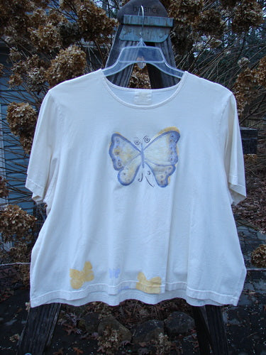 1999 Light Weight Short Sleeved Crop Tee Butterfly Natural Size 2, featuring a butterfly design, short sleeves, and a cropped, boxy shape, ideal for summer.