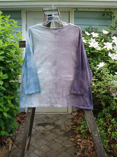 Barclay Long Sleeved A Lined Tee in Mottled Lavenders features a rounded neckline, almost full-length sleeves, and an A-line shape with a Vincent Van Gogh quote, enhancing its vintage charm.