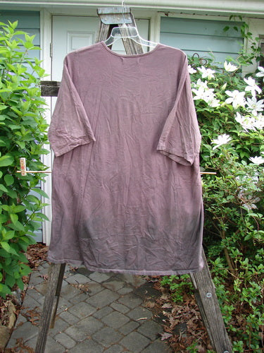 Barclay Tournesol Tunic Triple Stem Mottled Dark Rose OSFA showcasing a tunic dress with drop shoulders, loose three-quarter sleeves, and a longer back hem, highlighting its artistic design and generous fit.