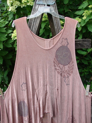 1999 Acetate Lycra Rosewater Sleeveless Pullover Circle Flower Rosetta OSFA features a loose fit, flared tiered hem, and deeper V neckline, showcased on a rustic ladder with floral motifs.