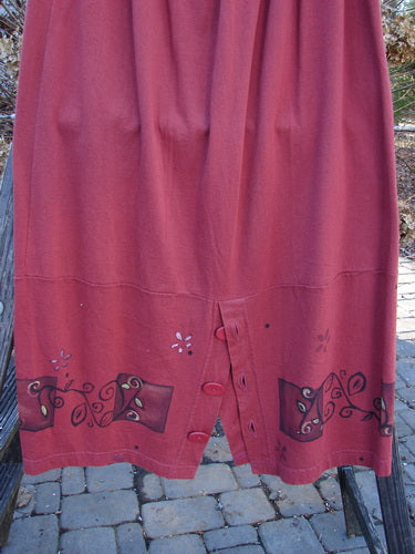 1997 Hearth Peplum Button Duo Vines Brick Size 2 showing a red skirt with buttons, featuring a full elastic waistline, oversized buttons on the walking vent, and deep inseam side pockets.