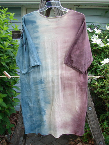 Barclay Tournesol Slim Tunic Bamboo Leaf Mottled Dusk OSFA features a mid-length design with drop shoulders, loose three-quarter sleeves, and a rounded neckline, showcasing a bamboo leaf motif.