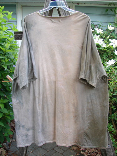 Barclay Art Top Blue Fish Sign Mottled Stick OSFA, featuring a tunic length, drop shoulders, loose three-quarter sleeves, rounded neckline, and varying hemline with vintage logo theme paint.