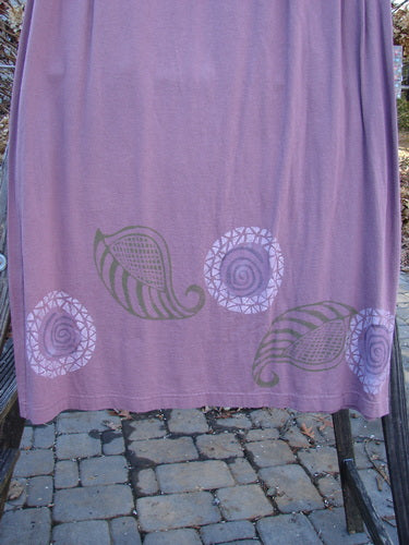 1996 Boulevard Festival Duo Laurel Size 1: A purple jacket with button accents and a matching skirt featuring intricate painted designs, both made from organic cotton with unique tailoring details.