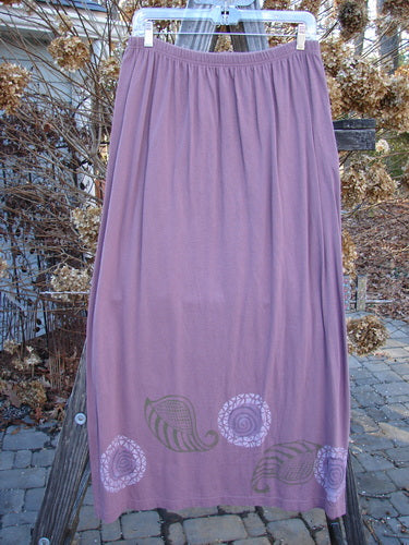 1996 Boulevard Festival Duo Laurel Size 1: A purple skirt with a floral design, featuring a full elastic waistline, slight A-line flare, and hand-painted festival theme from the Summer 1996 Collection.