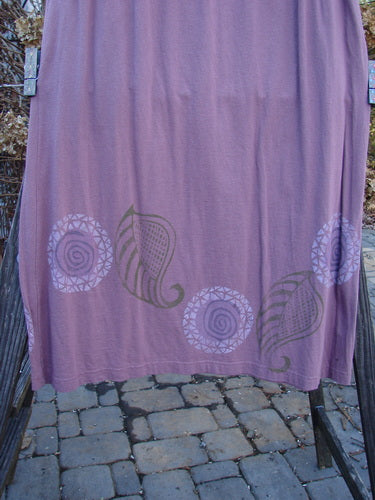 1996 Boulevard Festival Duo Laurel Size 1: a purple skirt with a unique painted design, featuring a full elastic waistline, slight A-line flare, and matching jacket with button accents and deep inseam pockets.