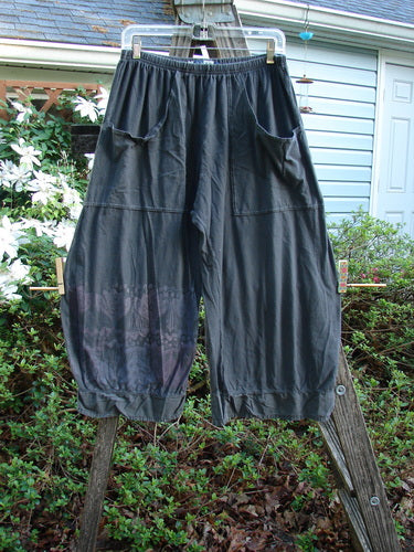 Barclay Flutter Bottom Crop Cargo Pant Tri Floral Raven Size 0 featuring a unique flutter hem, full elastic waistline, and dual floppy cargo pockets, highlighting a playful, artistic design in lightweight organic cotton.