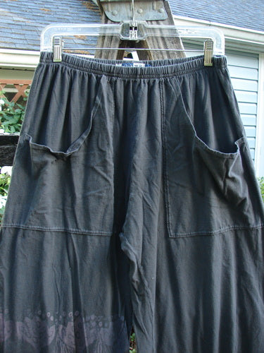 Barclay Flutter Bottom Crop Cargo Pant Tri Floral Raven Size 0 features a sweet bottom flutter, full elastic waist, dual floppy cargo pockets, and alternating lower leg art, embodying Bluefishfinder.com's vintage style.