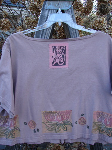 1993 Travel Top Lilly Pads Dried Rose Size 2 features a scooped neckline, cropped shape, Water Lilly theme paint, Blue Fish 93 patch, and wooden buttons. Perfect for layering and a collectible piece.