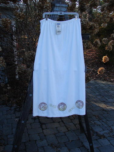 2000 NWT June Straight Duo Postage White Size 2: A white skirt with a post-themed design on the hem.