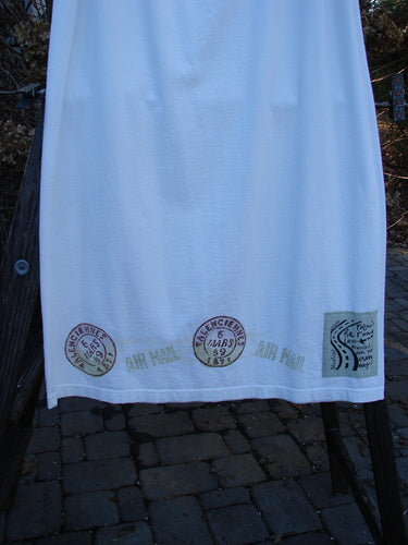 2000 NWT June Straight Duo Postage White Size 2: A white towel with stamps on it, part of the Summer 2000 Collection.