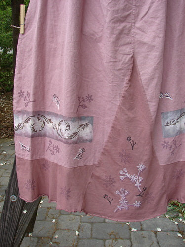 Barclay Linen Duet Skirt Falling Fern Dried Rose Size 2 features a full elastic waistline, widening bell shape, varying hemline, and floral design with sectional panels and a front V-shaped insert.