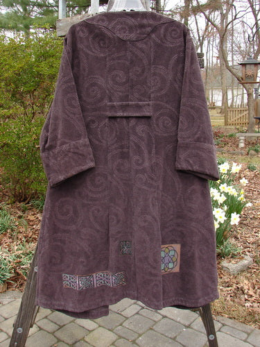 2000 Patched Upholstery Diwmach Coat Celtic Time Aubergine Size 0, featuring a damask paisley pattern, colorful patches, large pocket, scalloped neckline with vintage buttons, belled sleeves, and pleated back.
