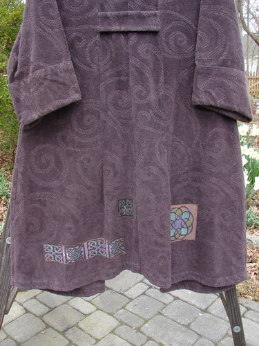 2000 Patched Upholstery Diwmach Coat Celtic Time Aubergine Size 0 features a luxurious damask paisley pattern with colorful patches, a scalloped neckline, belled sleeves, and a pleated, tabbed rear.