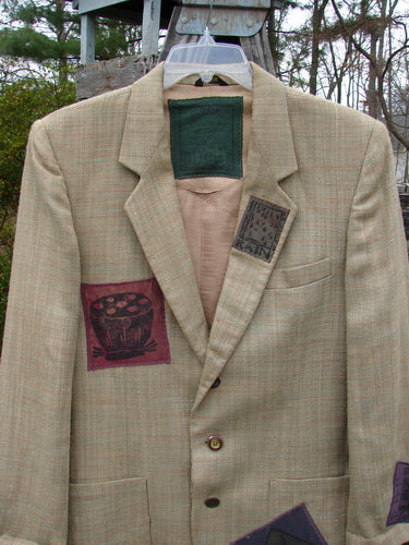1994 Patched Blazer Elements Grass Wheat Tweed OSFA: A medium-weight wool blazer with nature-themed patches, square shoulder pads, three-button closure, and plaid pattern, featuring multiple pockets and a vintage 94 interior signature patch.