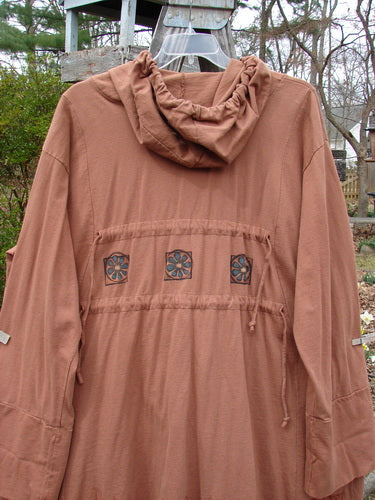1998 Albion Hooded Jacket Coat Harvest Time Rockwood OSFA: A brown jacket with a cozy hood, front tie closures, triangular pockets, double-paneled sleeves, drop shoulders, and a distinct rear drawstring.