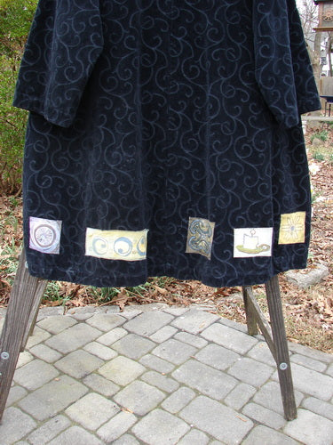 1999 Patched Poet's Coat Holiday Time Black Size 0 featuring oversized vintage buttons, colorful patched hem, diagonal front pockets, and a richly textured vine pattern.