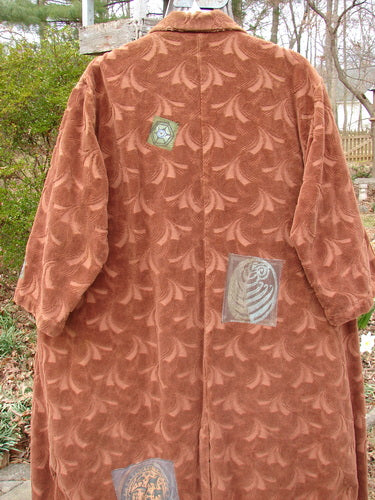1998 Patched Tapestry Coat Bountiful Path Rockwood OSFA: Brown, richly textured cotton coat with patch design, featuring a stand-up collar, vintage buttons, angular pockets, and intricate tapestry fabric.