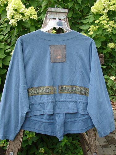1997 Treehouse Jacket Greek Column Blueprint Size 2 featuring a decorative woven band on the back, cool double-paneled V-neck, button line with original buttons, and drawcord flounce tied at the front.