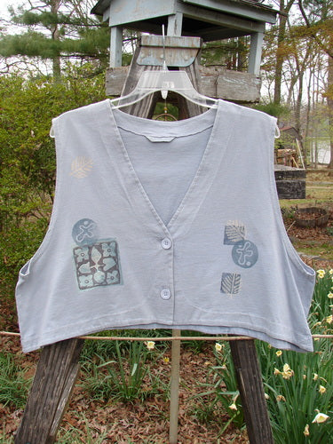 1994 Spruance Vest Topiary Solstice Blue OSFA featuring a unique topiary design, dual paper button closure, and wide A-line flare, perfect for layering and accentuating individuality.