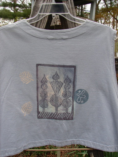 1994 Spruance Vest Topiary Solstice Blue OSFA features a detailed topiary theme on the back, dual paper button closure, and a unique cropped layering length, showcasing vintage Blue Fish Clothing's creative design.