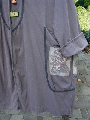 1998 Tiddly Winks Jacket Butterfly Madeira Size 2 features a loose fit, rolled sleeve, piped patch pockets with bee-and-flower motif, and decorative buttons, reflecting Bluefishfinder.com's vintage, expressive style.