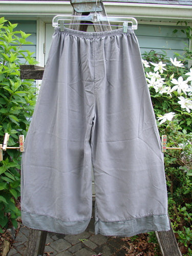Barclay Lyocell Flutter Bottom Straight Pant in Unpainted Grey Sky, features a full elastic waist, straight silhouette, and flutter hem, ideal for spring/summer, from Bluefishfinder.com's vintage-inspired collection.