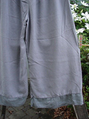 Barclay Lyocell Flutter Bottom Straight Pant in Unpainted Grey Sky, Size 0. Medium weight pant with full elastic waist, straight silhouette, and fluttered hem, ideal for spring or summer wear.