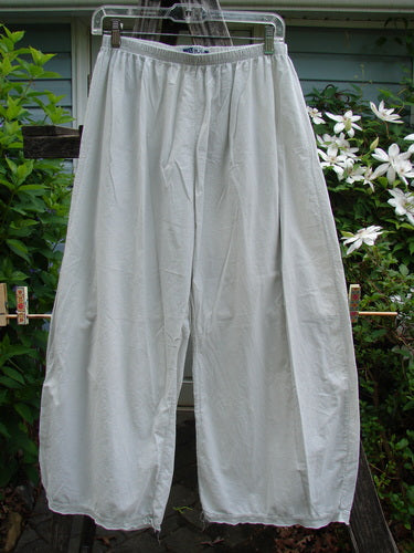 Barclay Batiste Tiny Flutter Pocketless Pant Unpainted Natural Size 0, showcasing a sweet bottom flutter, full elastic waist, longer straight shape with slightly widening lowers, crafted from lightweight cotton batiste.