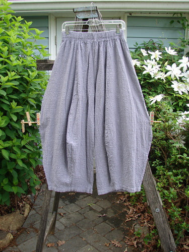 Barclay Pucker 4 Square Pant Unpainted Lavender Size 0 features a unique 3D diamond cut from the knee down, generous front pockets, and a full elastic waistband, showcasing vintage-inspired textured cotton.