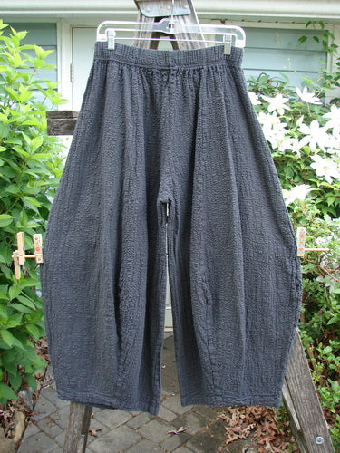 Barclay Pucker 4 Square Pant in Unpainted Ironwork Size 0, featuring a 3D diamond cut from knee down, generous front pockets, and a full elastic waistband, epitomizing textured elegance.