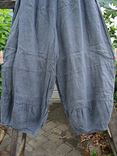 Barclay Linen Meadow Pant Unpainted Cross Dye Steel Size 0 features a flowy shape with a full elastic waist, gathered horizontal panels, and slightly narrowing lower legs, perfect for spring or summer.