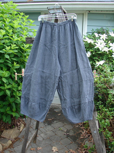 Barclay Linen Meadow Pant Unpainted Cross Dye Steel Size 0 features full elastic waist, wide flowy shape with flounced horizontal panels, narrowing lower leg seams, pocketless design, ideal for spring/summer wear.