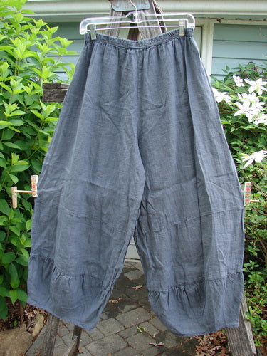 Barclay Linen Meadow Pant in Cross Dye Steel, Size 0, features a full elastic waist and wide flowy shape with gathered horizontal panels, perfect for spring and summer wear.