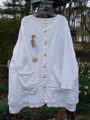 2000 Linen Beach Cardigan Seahorse White Size 2, featuring a seahorse design, deep front pockets, oversized buttons, and an A-line sweep, ideal for a vintage beach look.